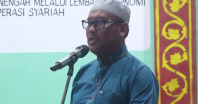 Foto: Kepala Desa Pasir Putih, Ahmadi.