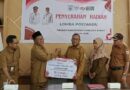 Foto: Pemdes Pasir Putih menerima Juara I Lomba Posyandu Tingkat Kabupaten